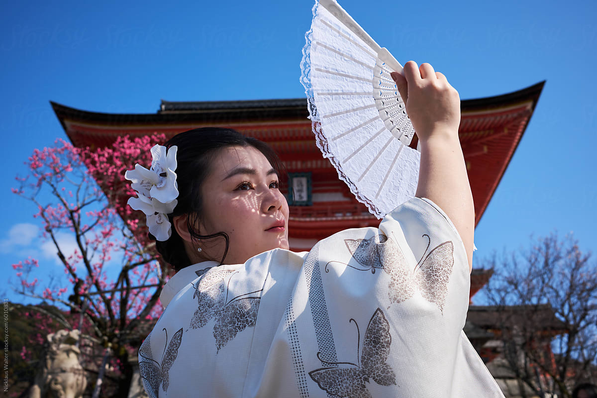 Asian Woman Wearing A Kimono At Kiyomizu-dera Temple In Kyoto, Japan.