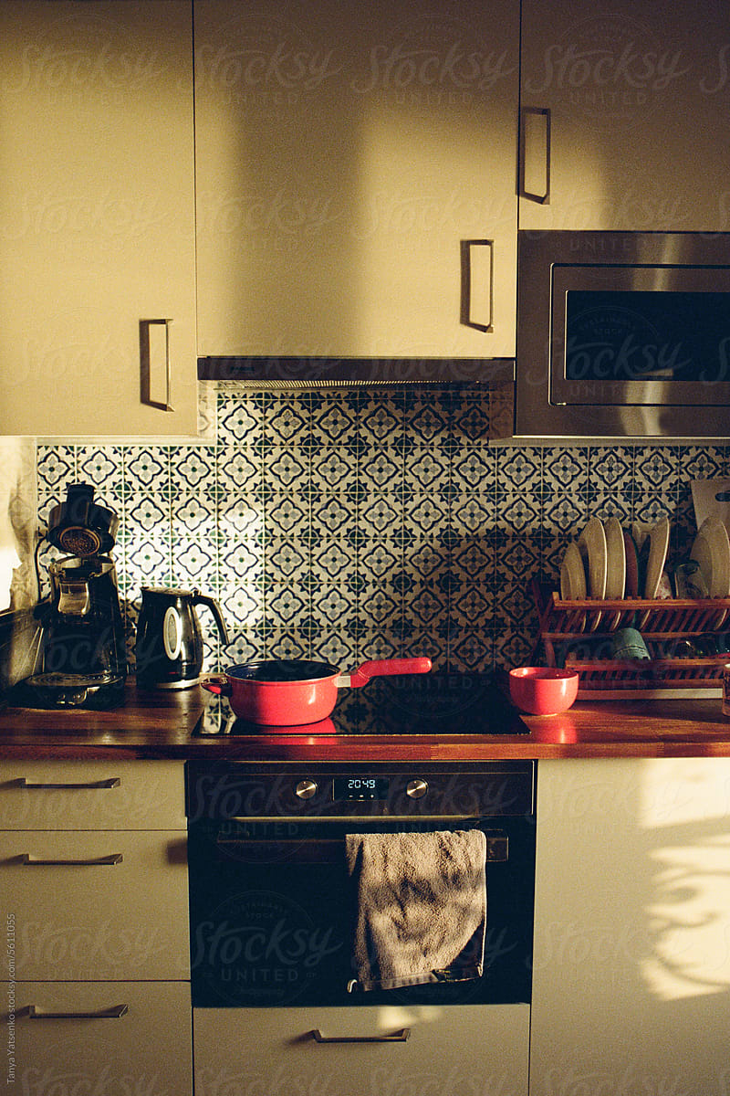 A kitchen in a sunset light