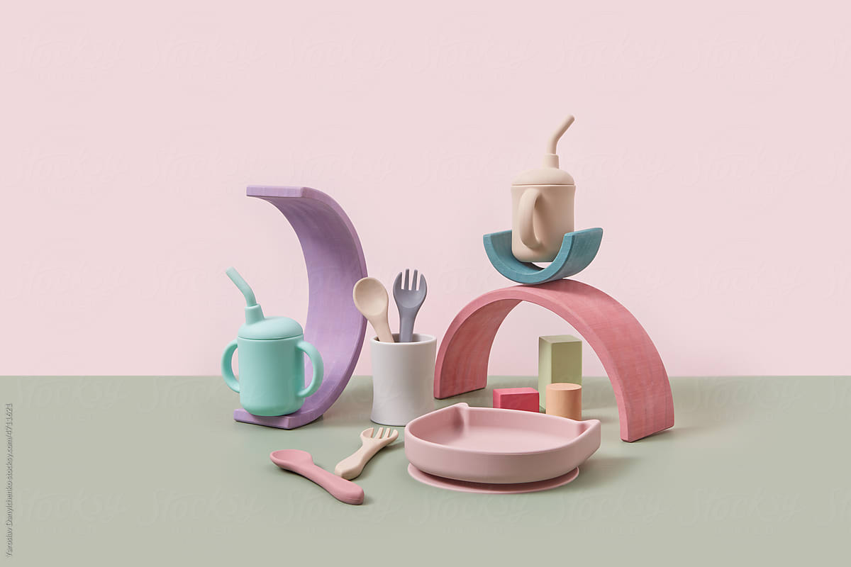 Balancing construction of kid tableware and wooden planks