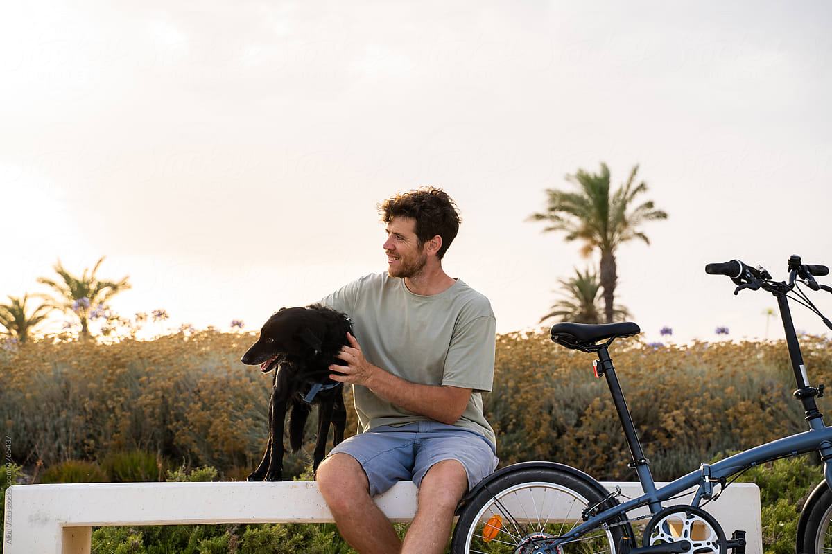 Man with dog on park