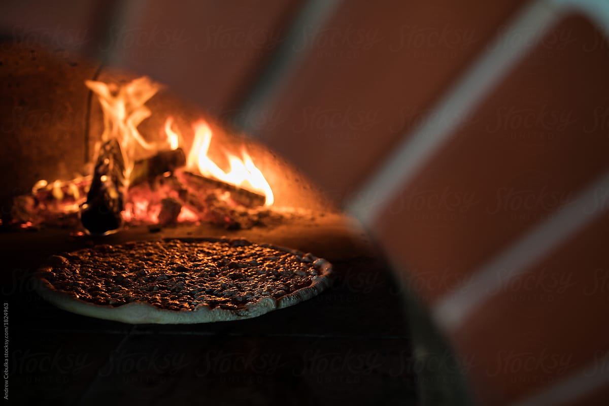 Pizza in wood burning stove
