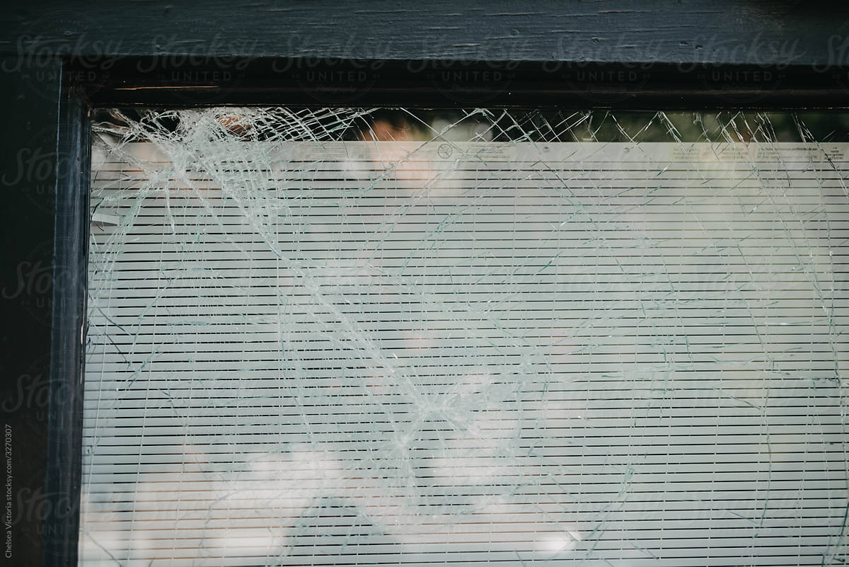 A smashed window from political protest