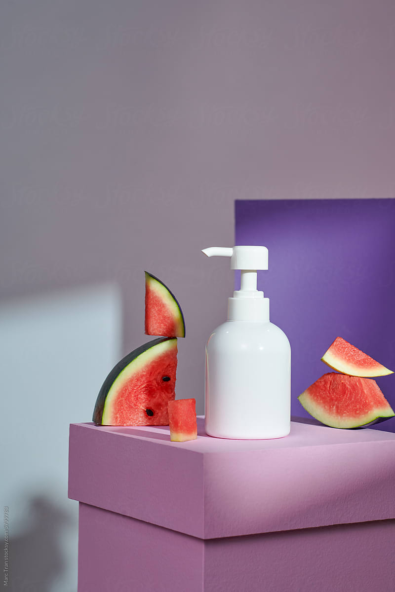 Beauty Serum Pump on Tower with Watermelon Slice Ingredients,