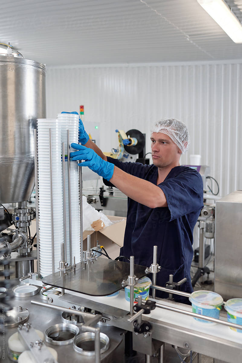 Man Working At Butter Processing Plant