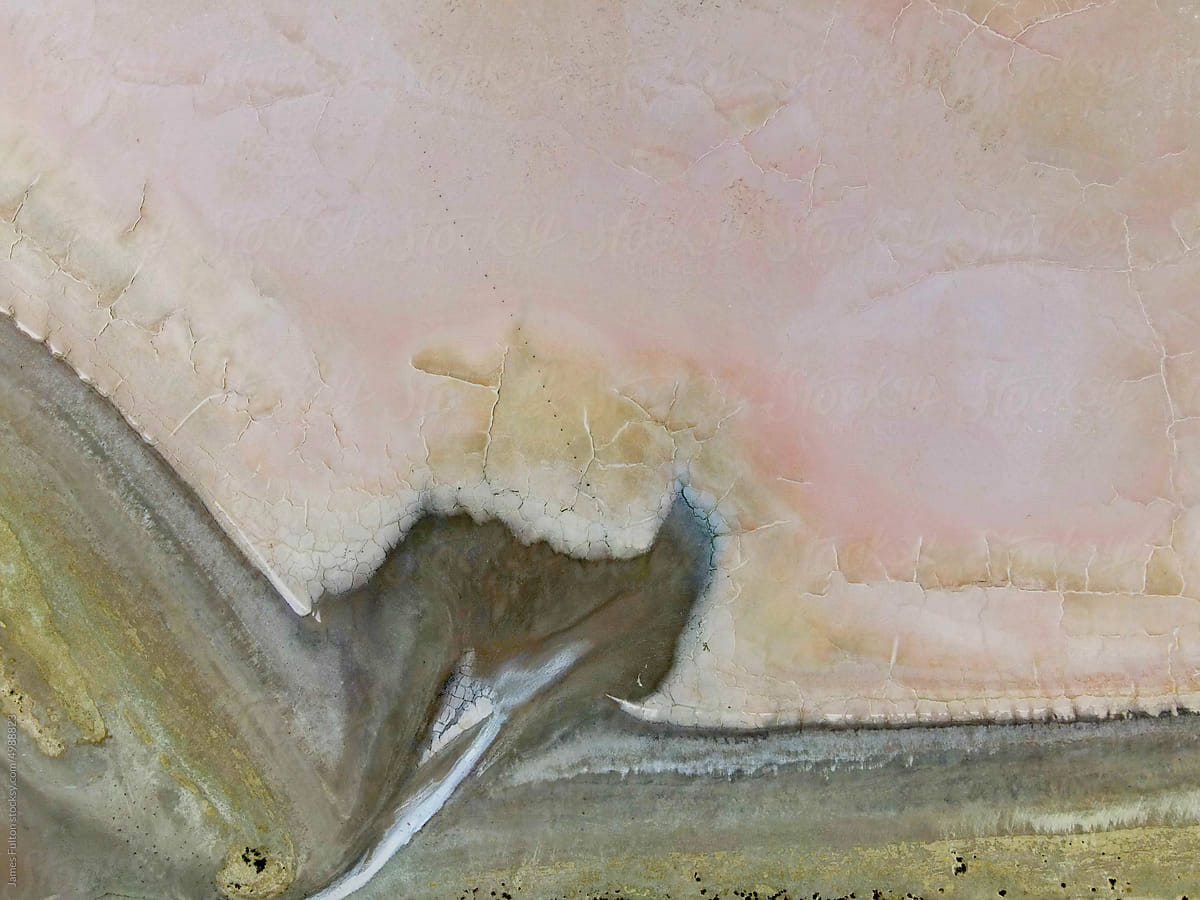 Abstract of a light pink salt lake that looks like a painting