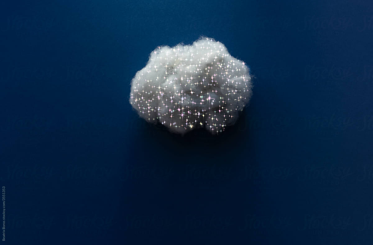 Sparkly cotton cloud on blue background