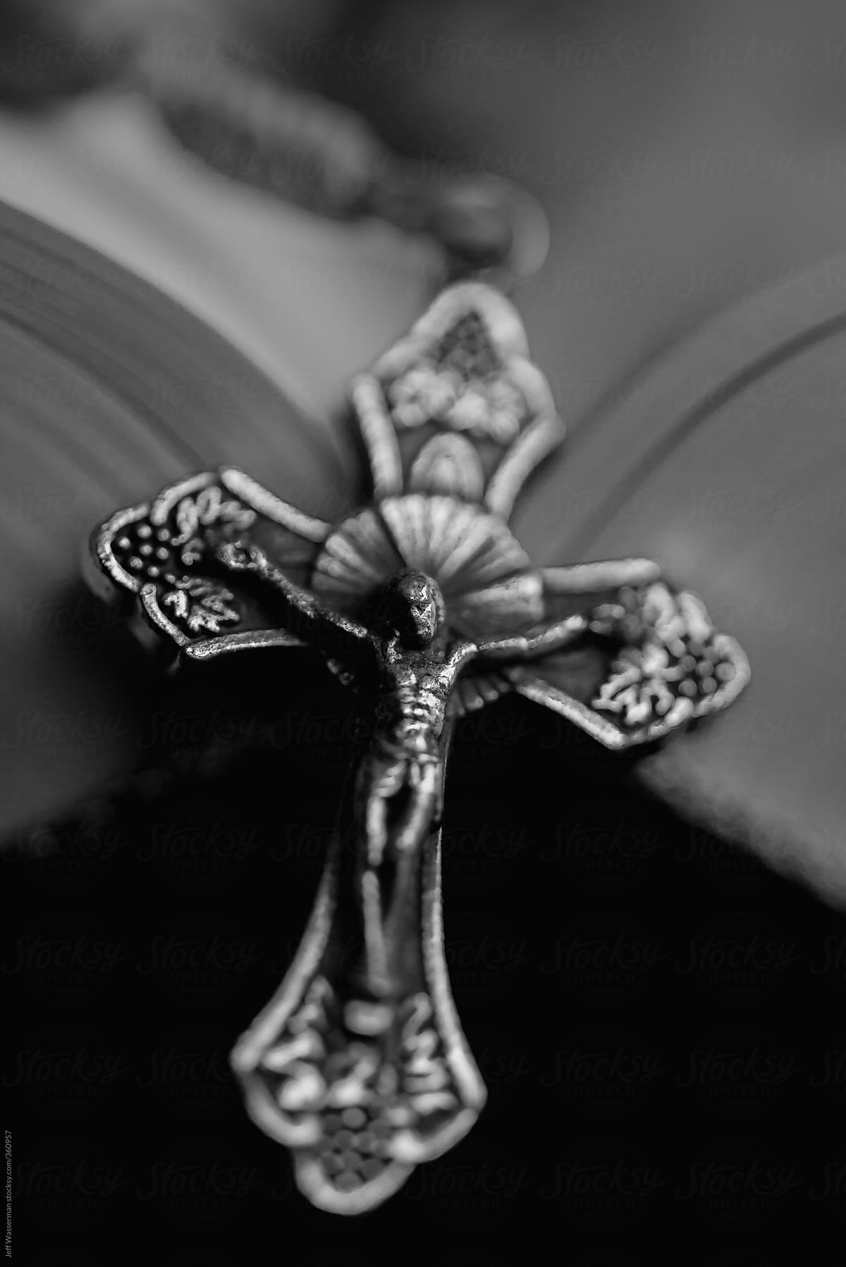 Rosary and Christian Bible in Macro