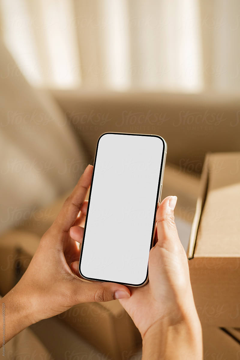 Mockup phone with white screen and Unboxing parcels