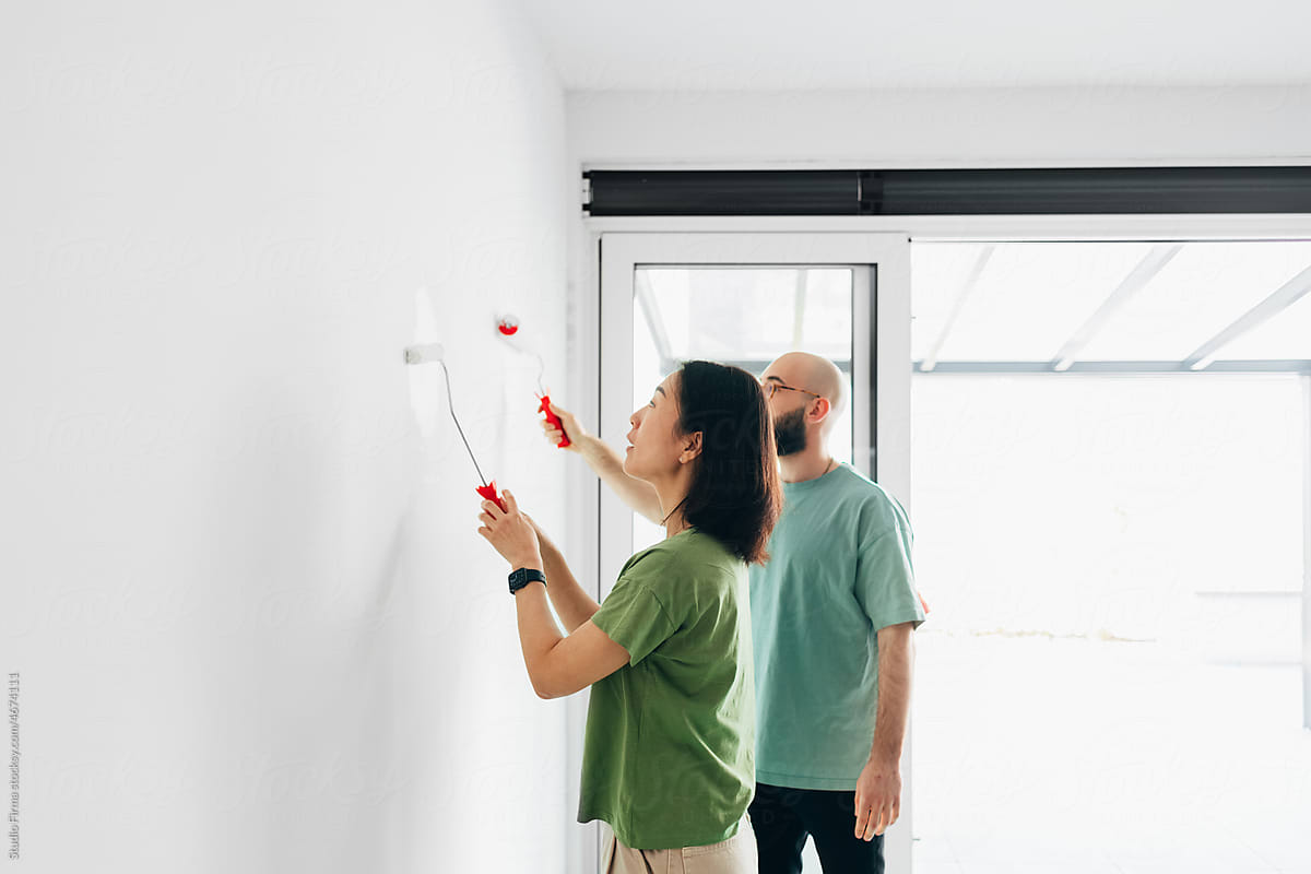 Couple Painting Wall