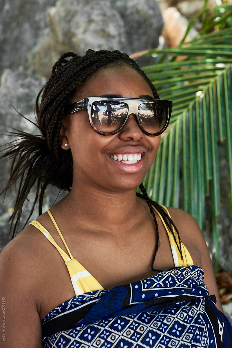 Black Woman With Sunglasses At The Beach By Stocksy Contributor Ivan