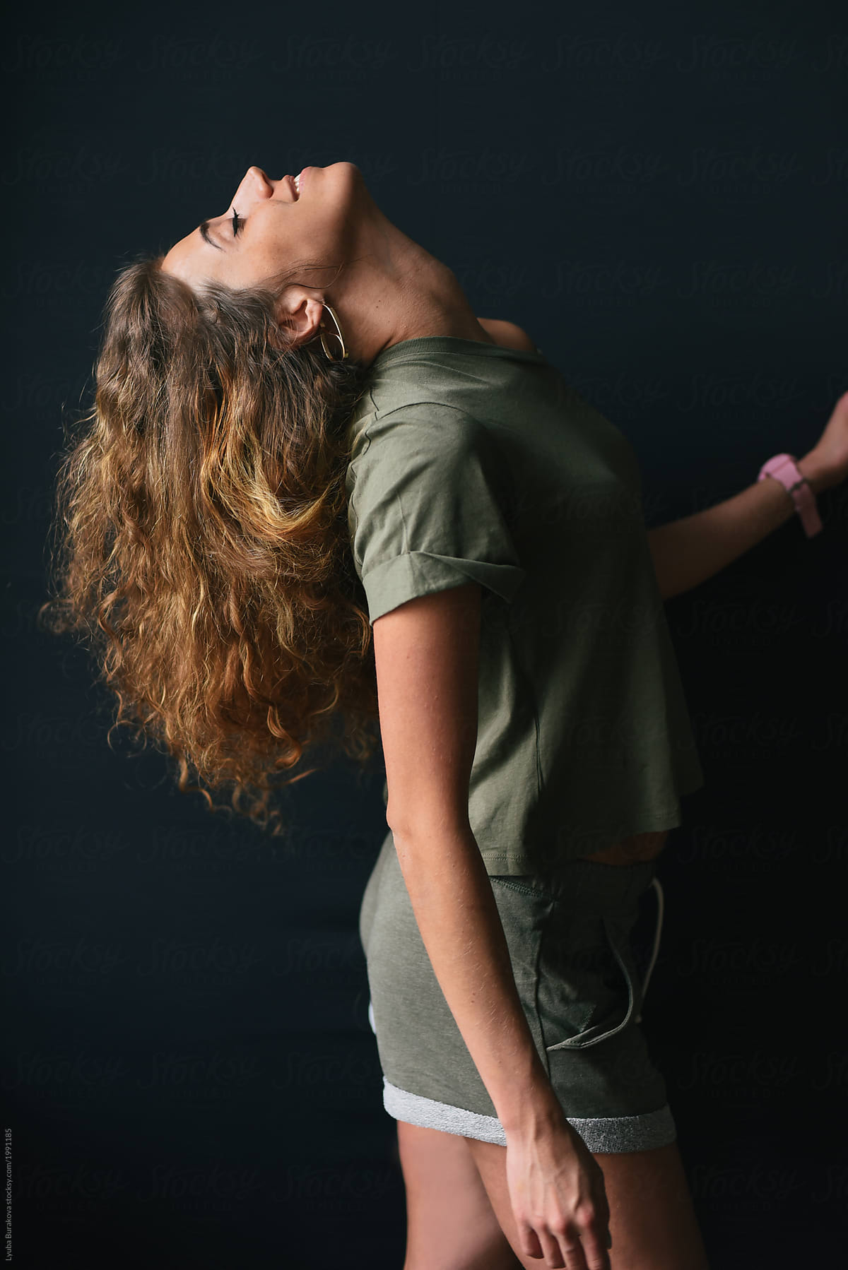 Profile Of Young Woman With Curly Hair Del Colaborador De Stocksy Amor Burakova Stocksy 