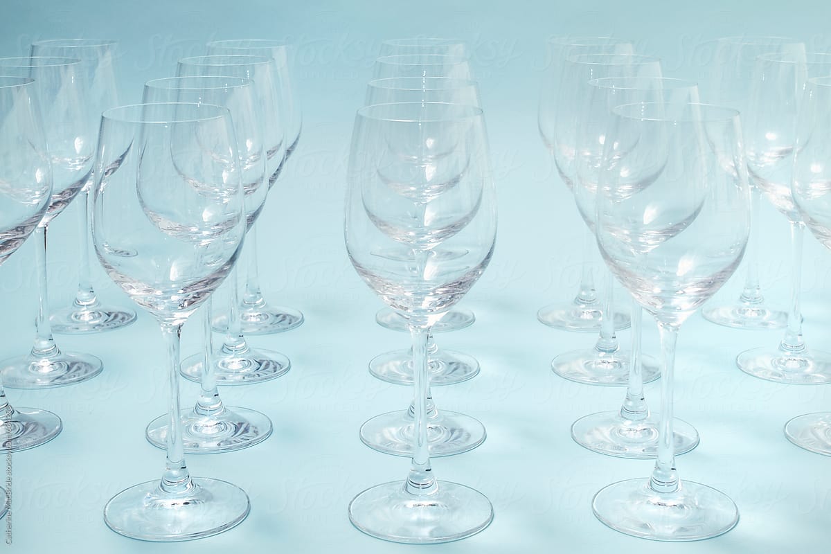 Rows of white wine glasses