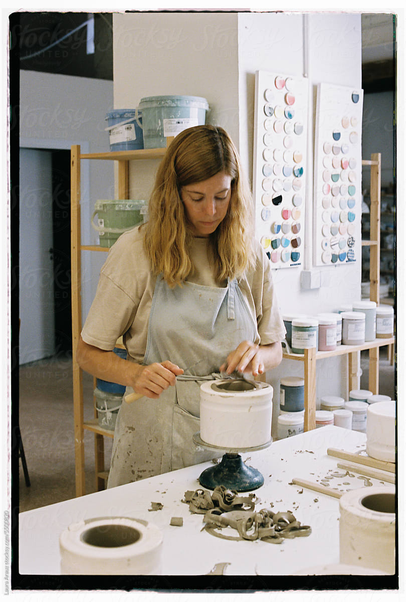 Ceramist working at pottery studio