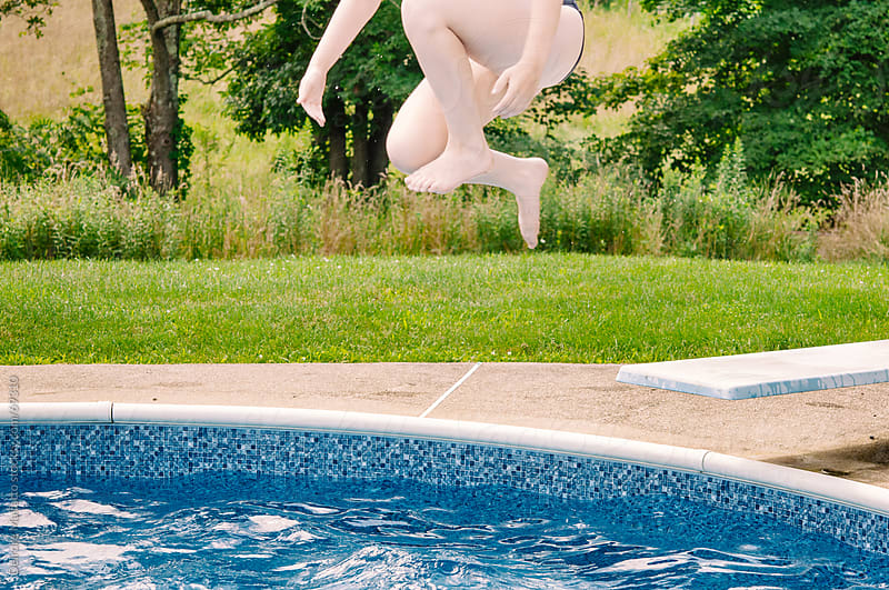 Legs Of A Girl Jumping Off Diving Board Into Pool By Deirdre Malfatto 