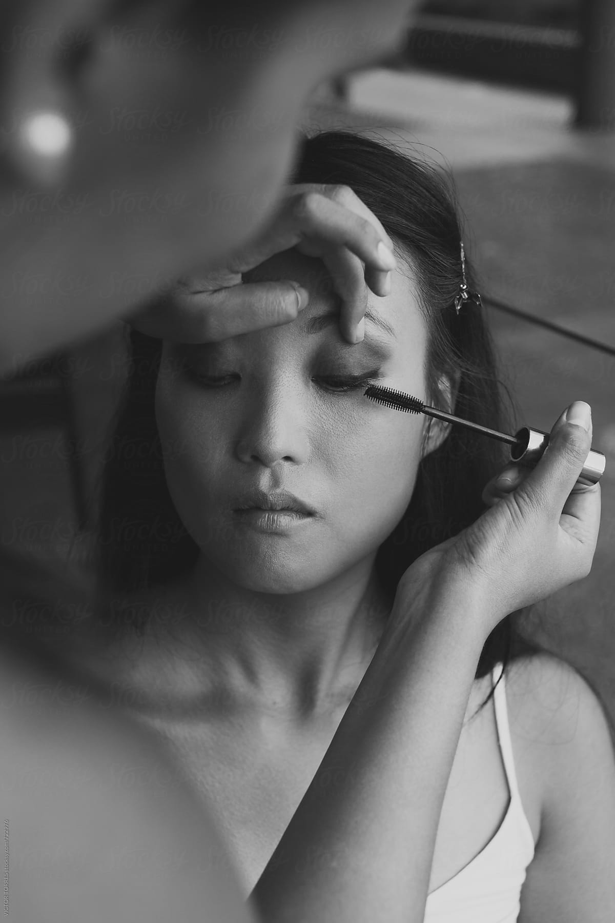 Make-up Artist Working with a Japanese Model in the Street