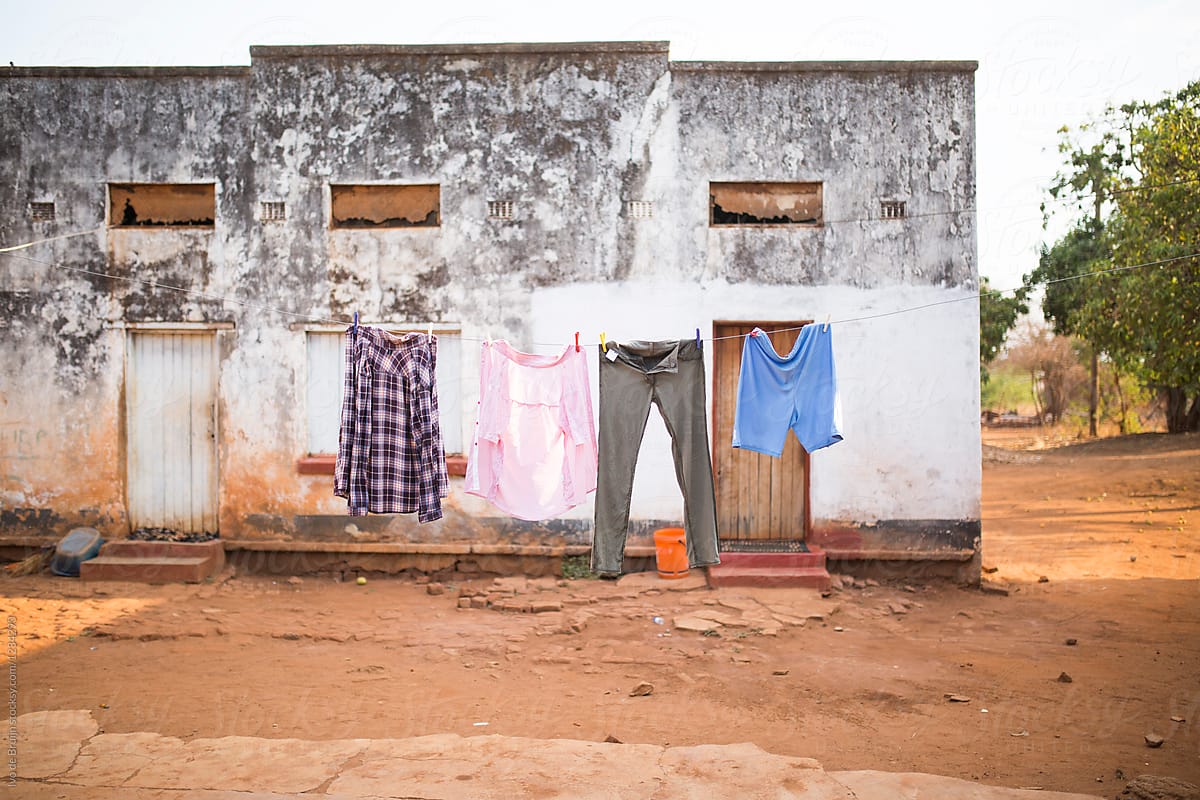 Clothes hanging to dry in front of a house in Zambia