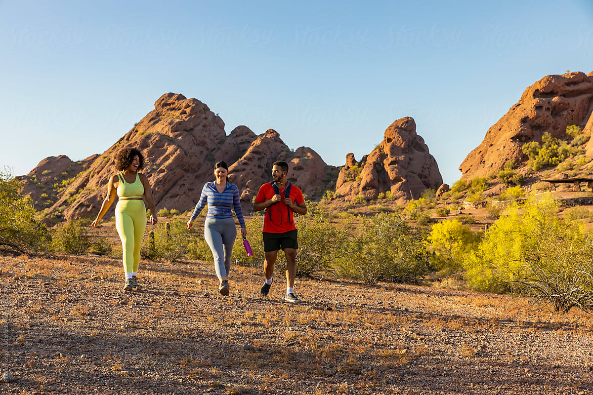 Group of Friends Hiking together in Arizona Desert arid landscape