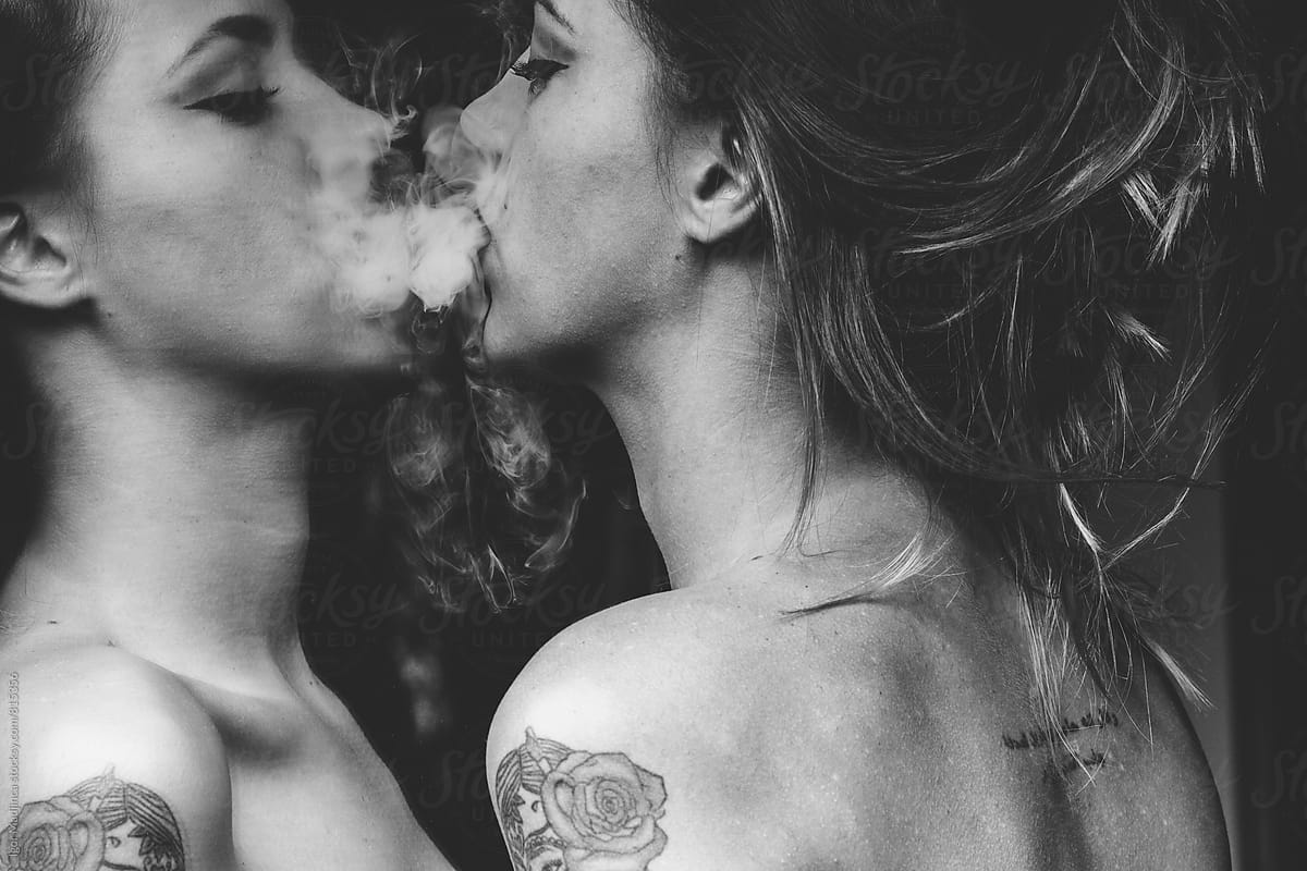 smoke,beautiful tattooed girl in front of mirror