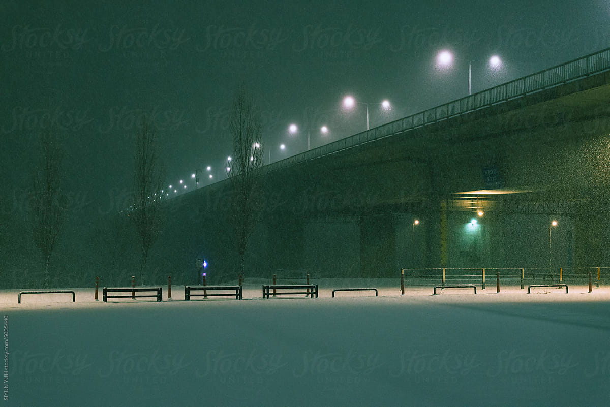 Bridge in snow storm at night
