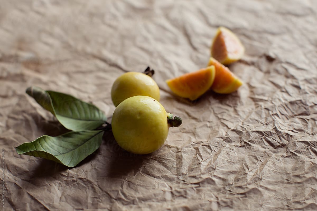 Ripe guava fruit on a brown paper bag background