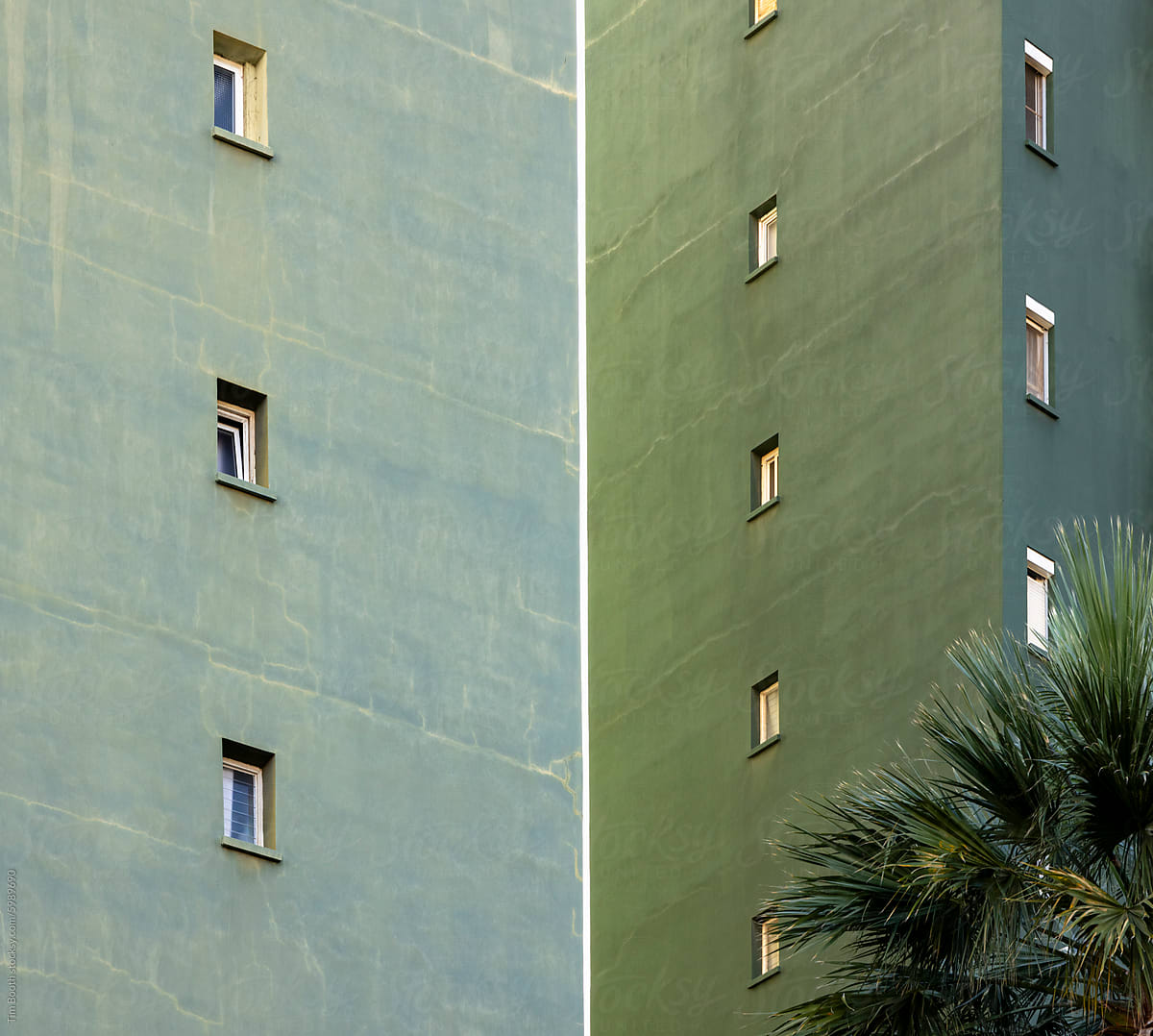 Green apartment building exterior