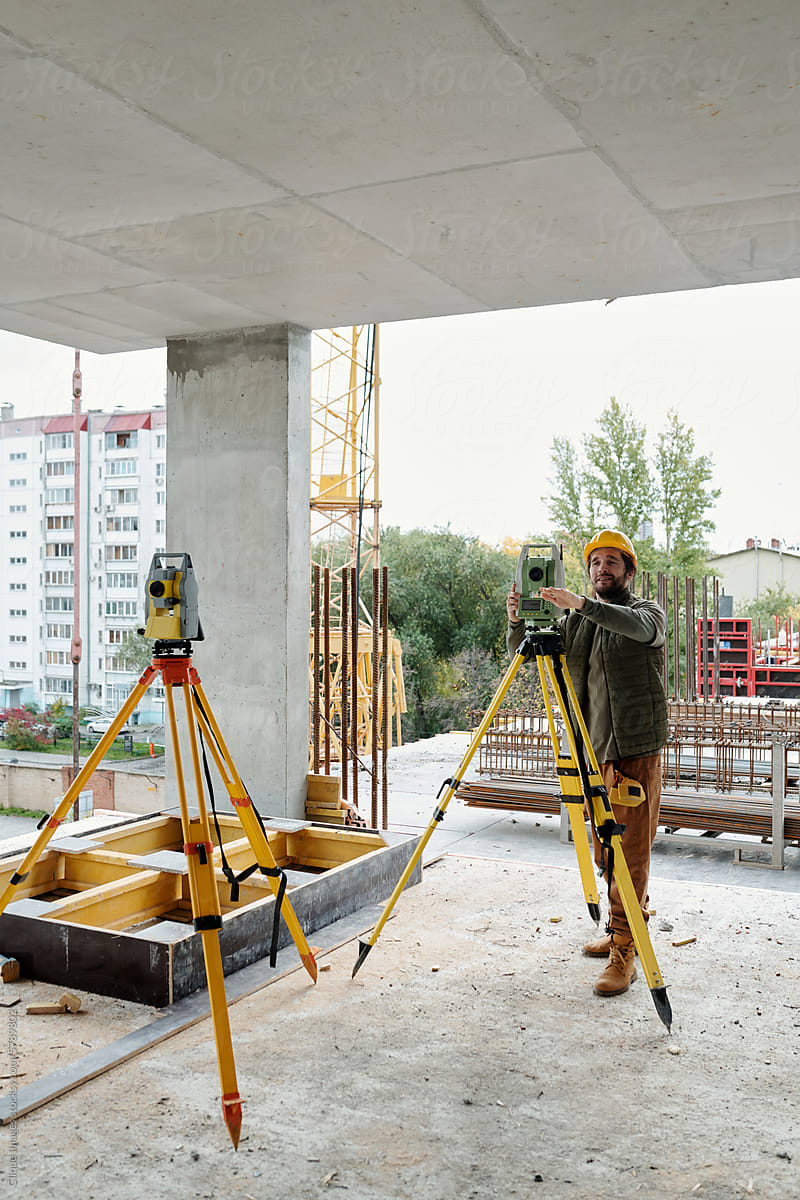 Construction Worker Setting Theodolite