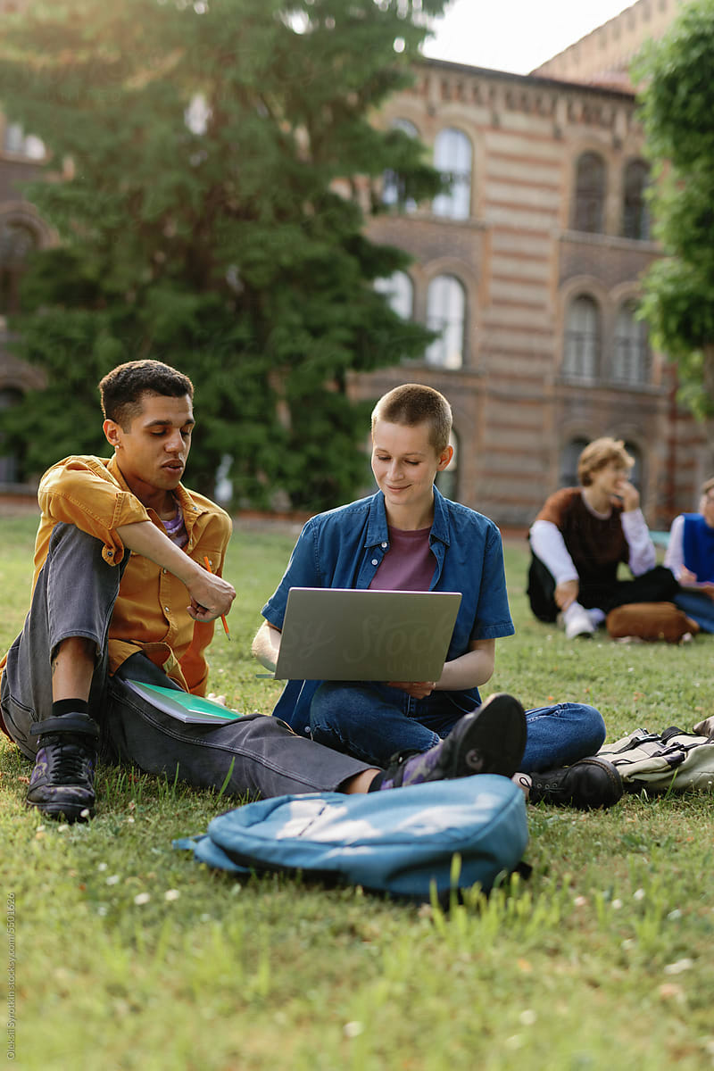 Online mates surfing homework students dormitory backyard