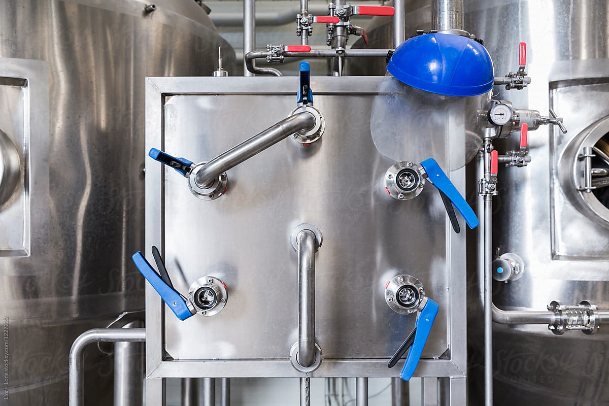 Stainless steel fermentation containers in a brewery