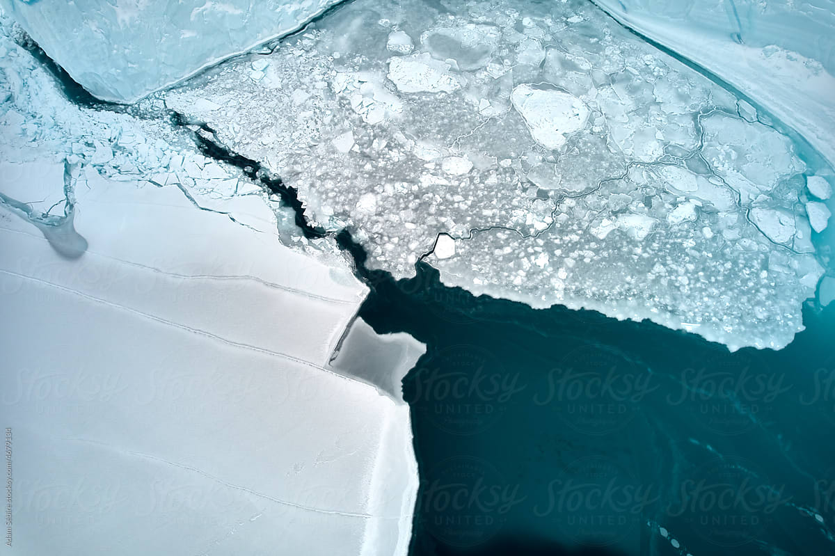 Greenland winter aerial view: sea ice fragments, Arctic global warming