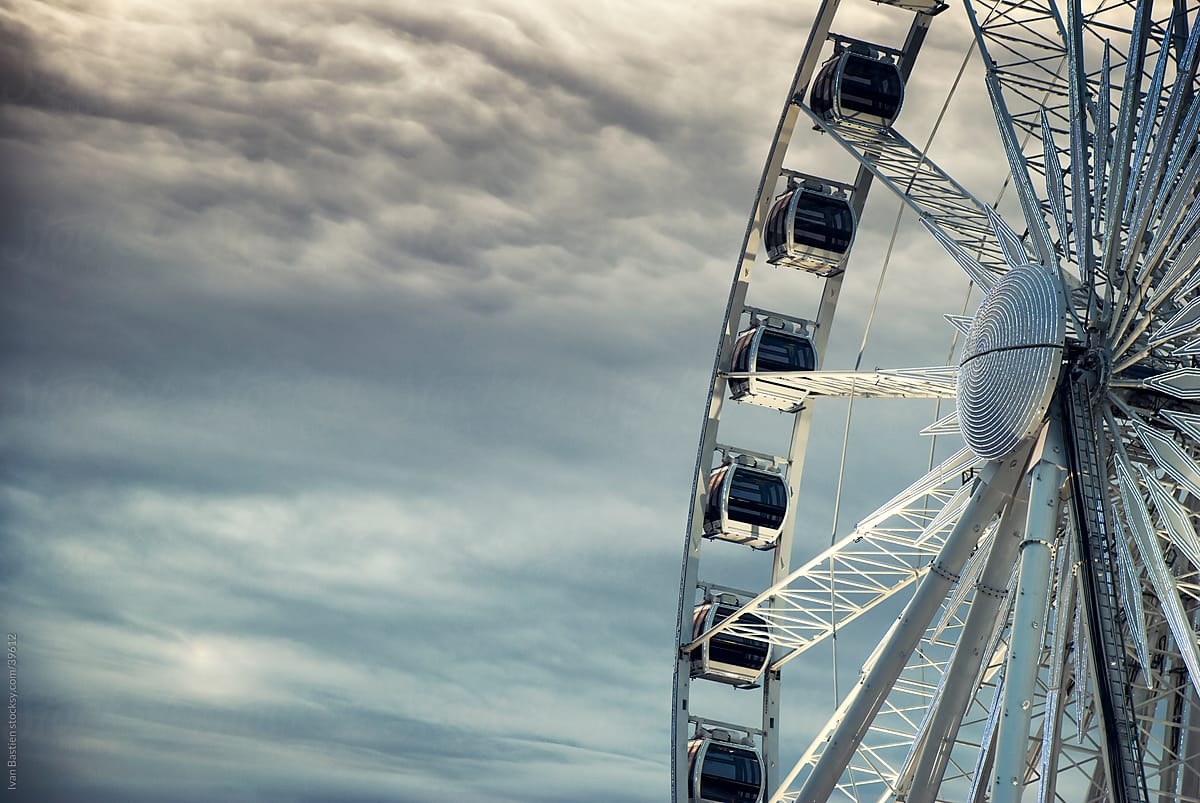 Ferris wheel and overcast sky