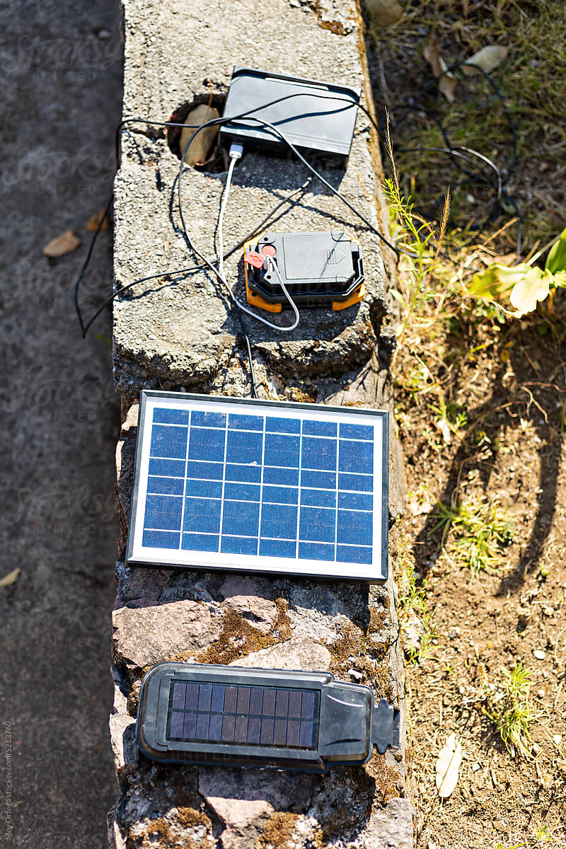 Solar Lamps Charging On The Floor