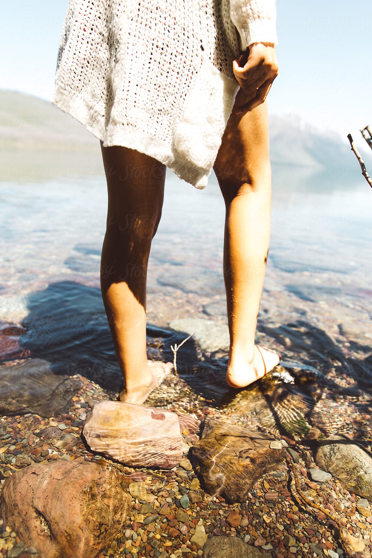 Womans Legs in Lake near Glacier National Park, Montana