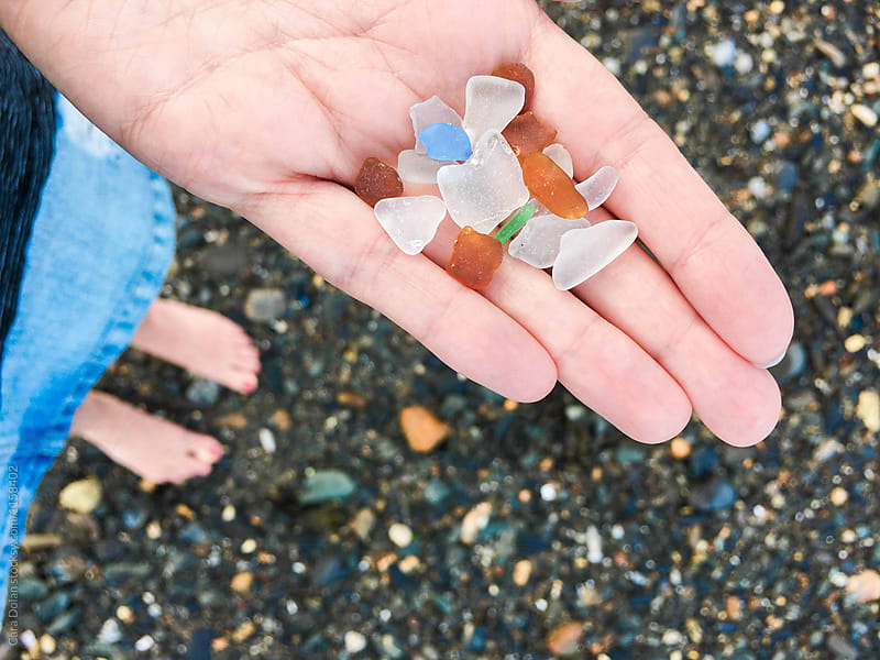 Collecting sea glass at the beach
