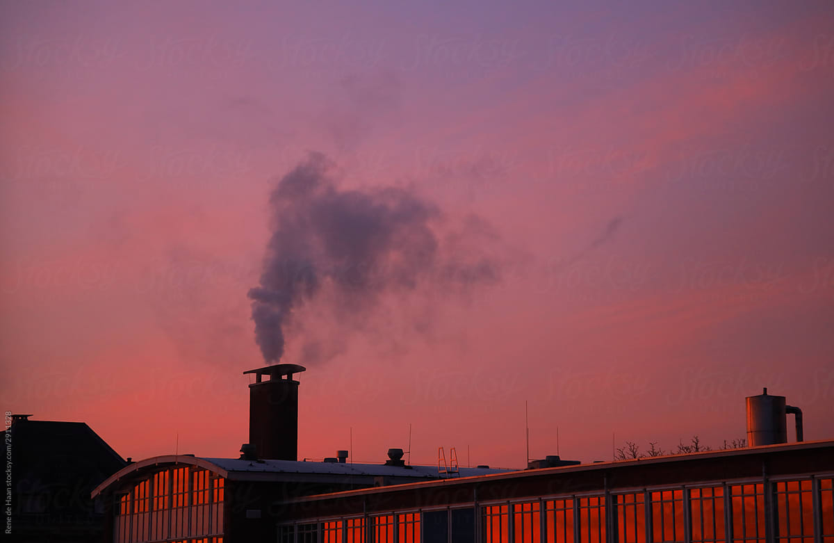 smoke from chimney at dawn