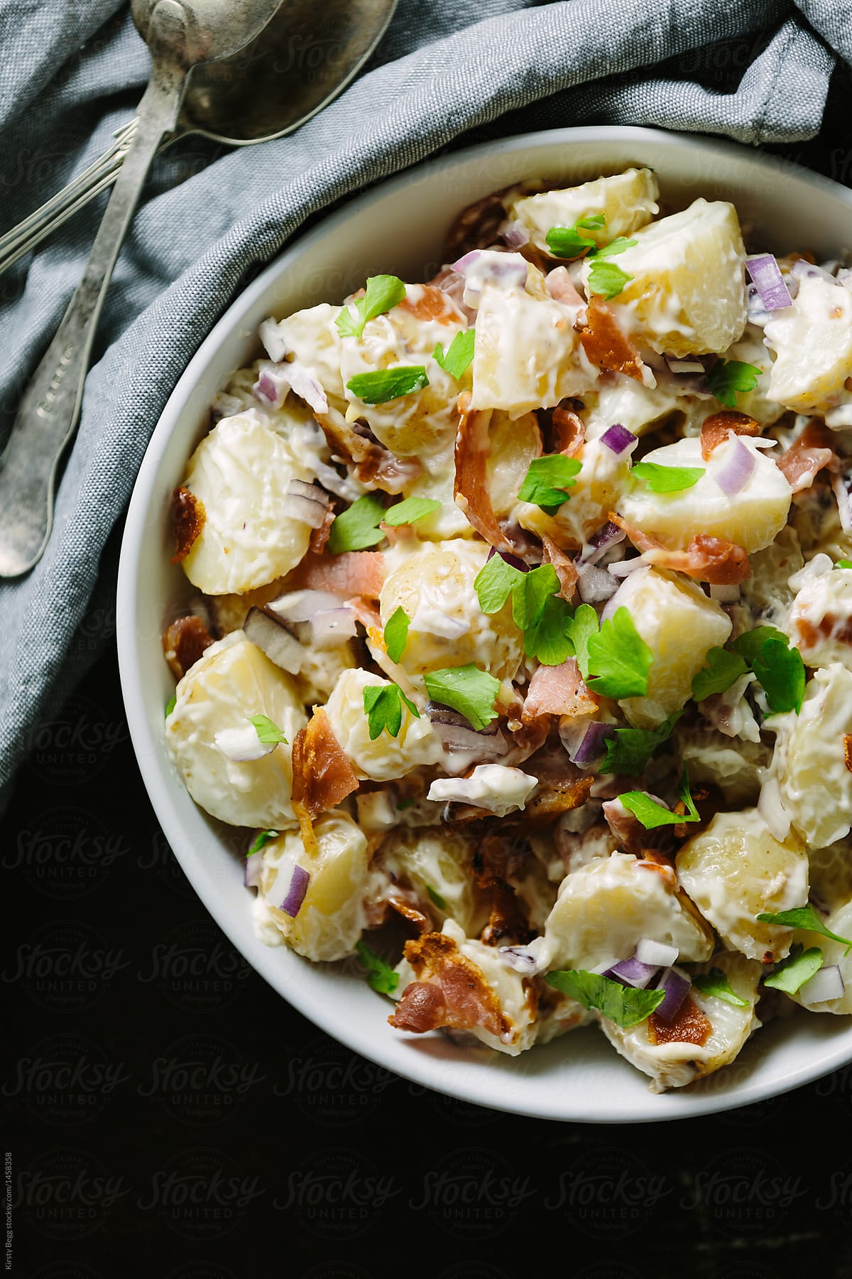 Creamy bacon potato salad in bowl
