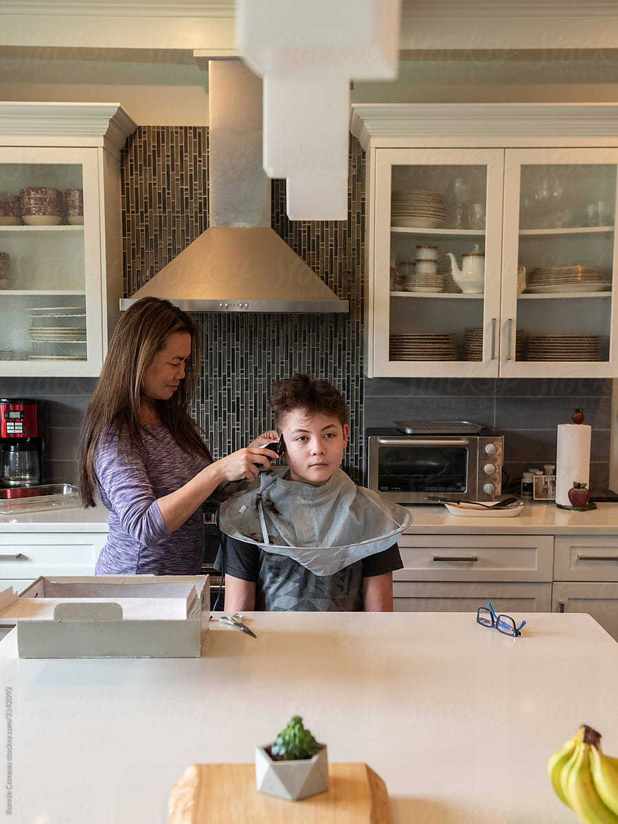 Home Haircut - Mother Cutting Son\'s Hair