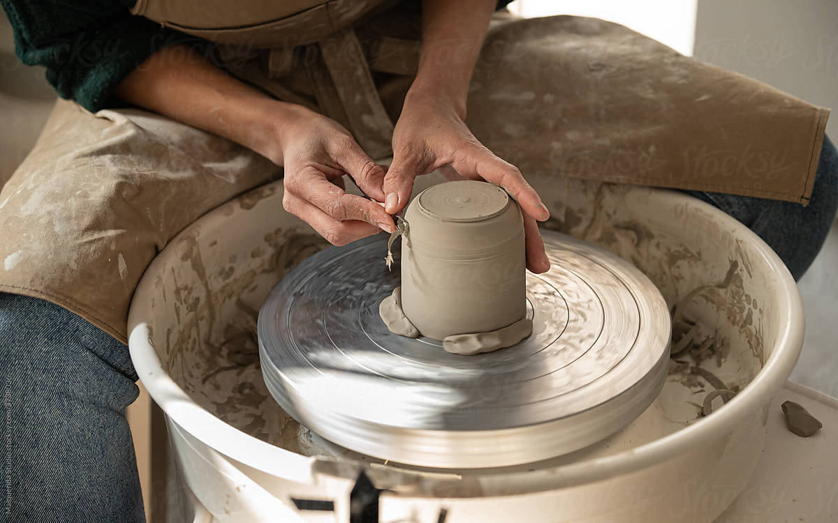 Anonymous Artisan Making A Vase With A Lathe by Stocksy Contributor  Malquerida Studio - Stocksy