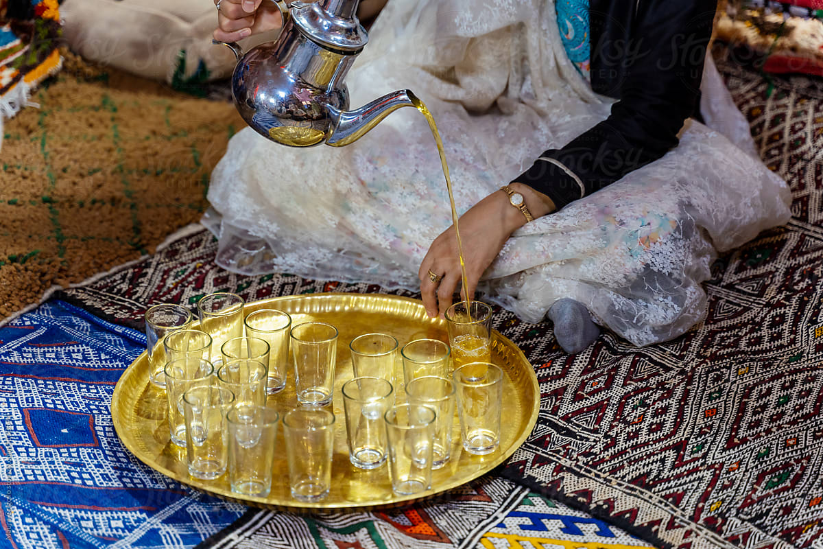 Woman serving Moroccan tea