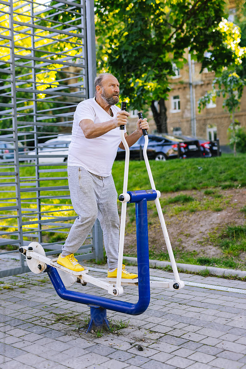 Man using elliptical equipment