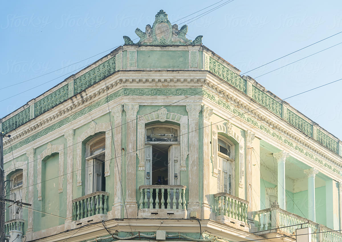 Green Vintage Building With Shops In Cienfuegos, Cuba