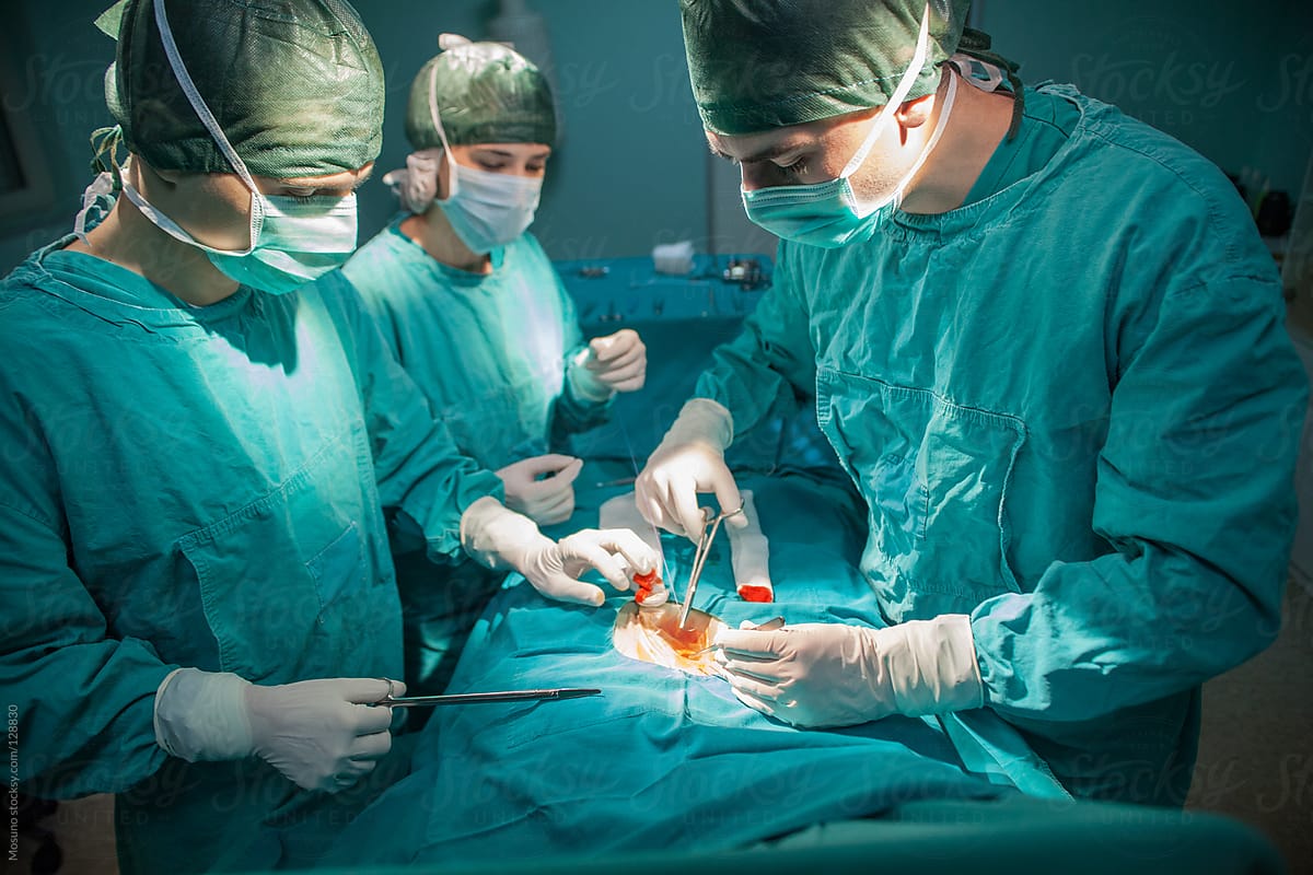 Surgeons Operating on a Patient