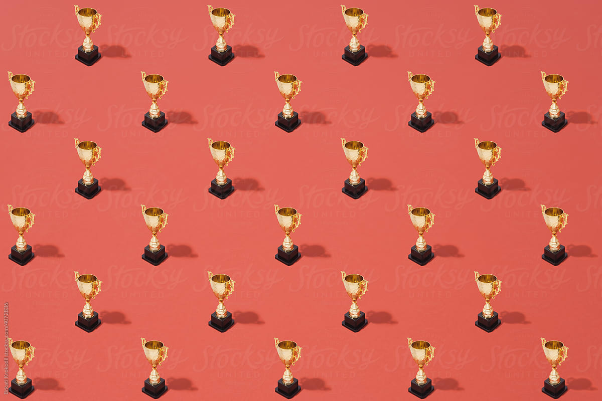 Golden Trophy Pattern On Red Background