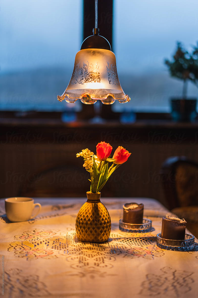 Flower vase on top of coffe table on cottage house