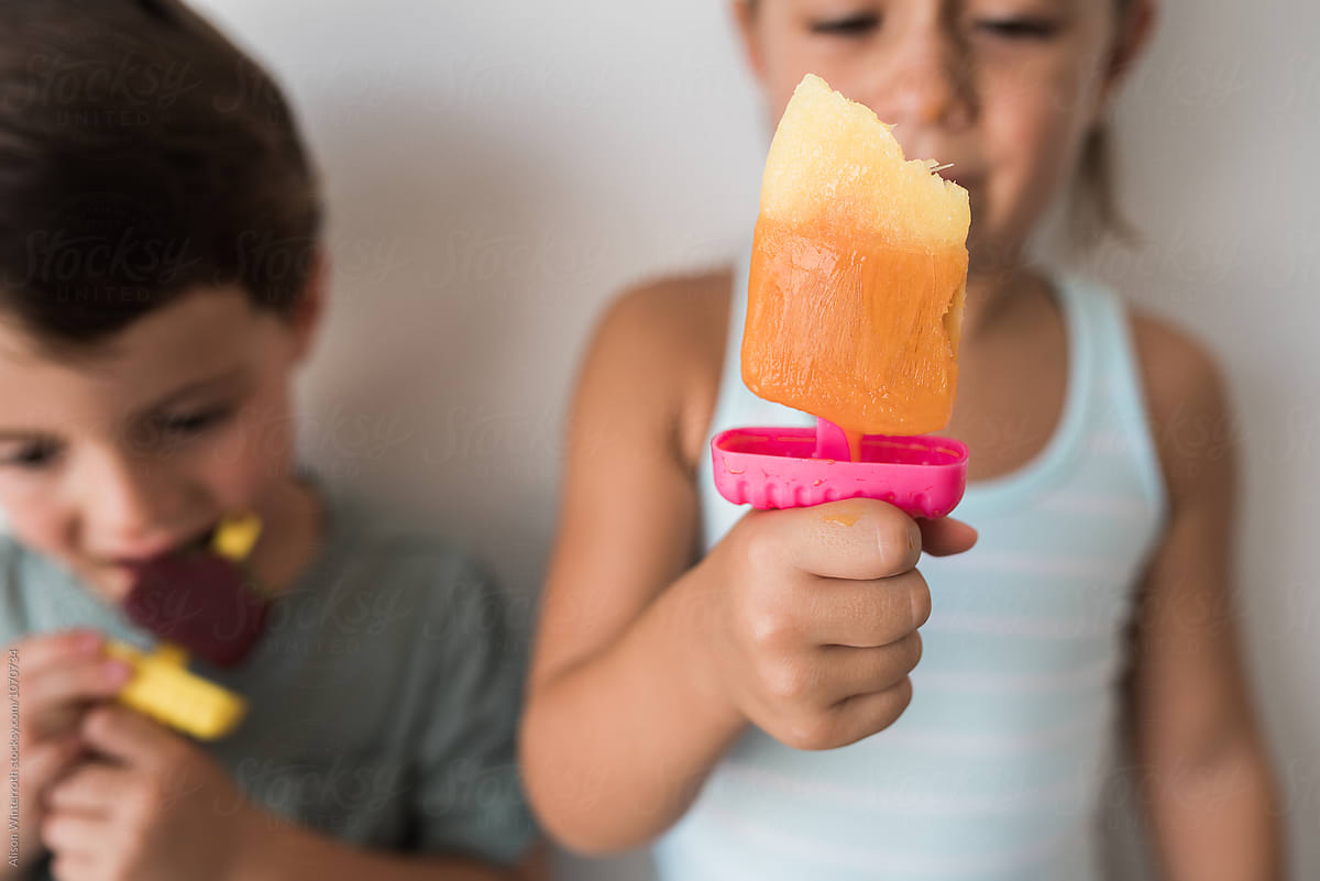 Children With Half Eaten Popsicles