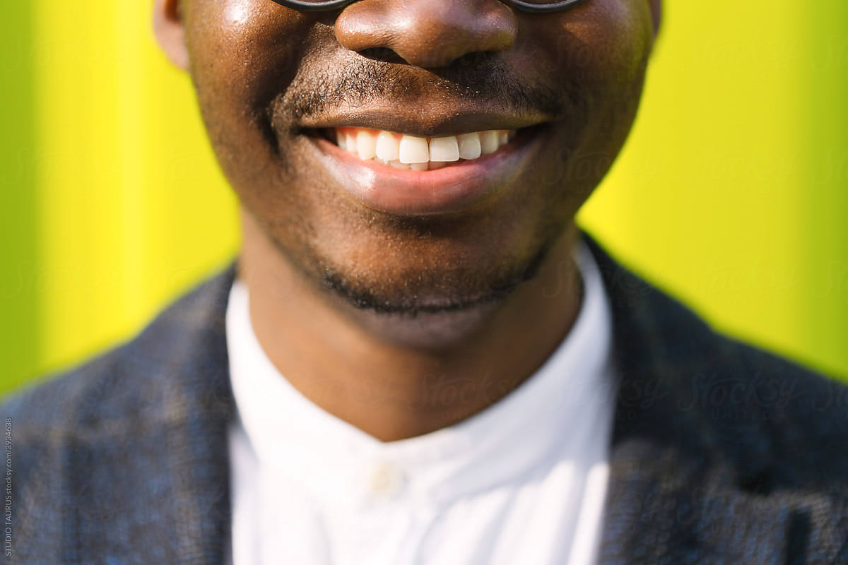 Black Man Against Yellow Background