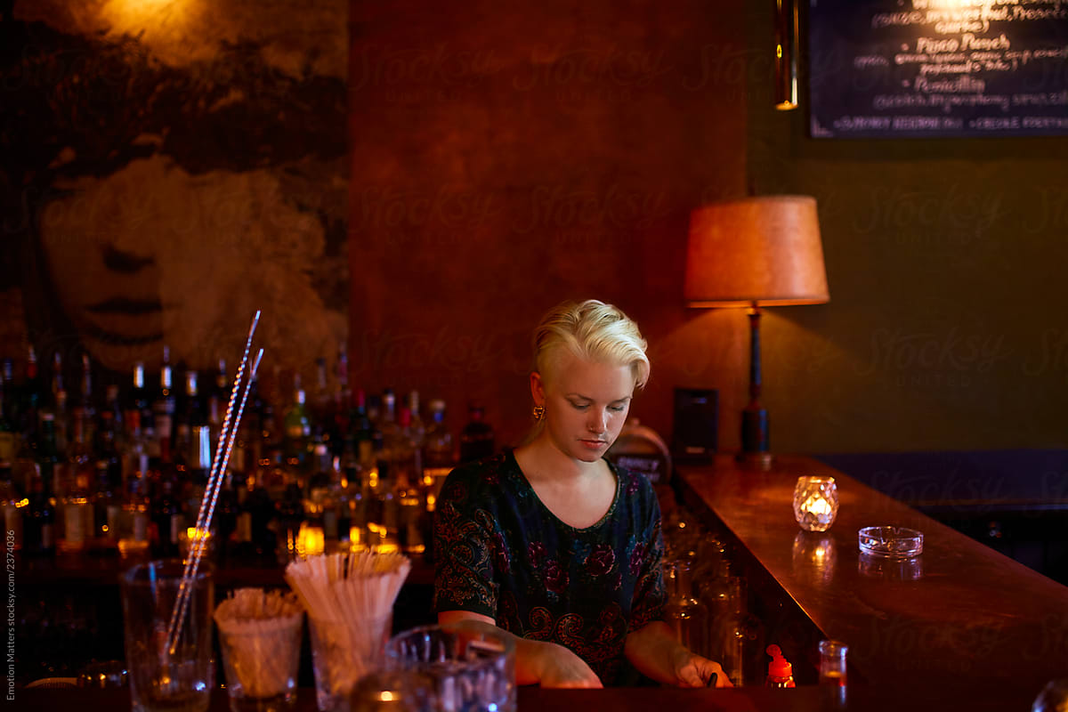 Close up of a waitress preparing the bar