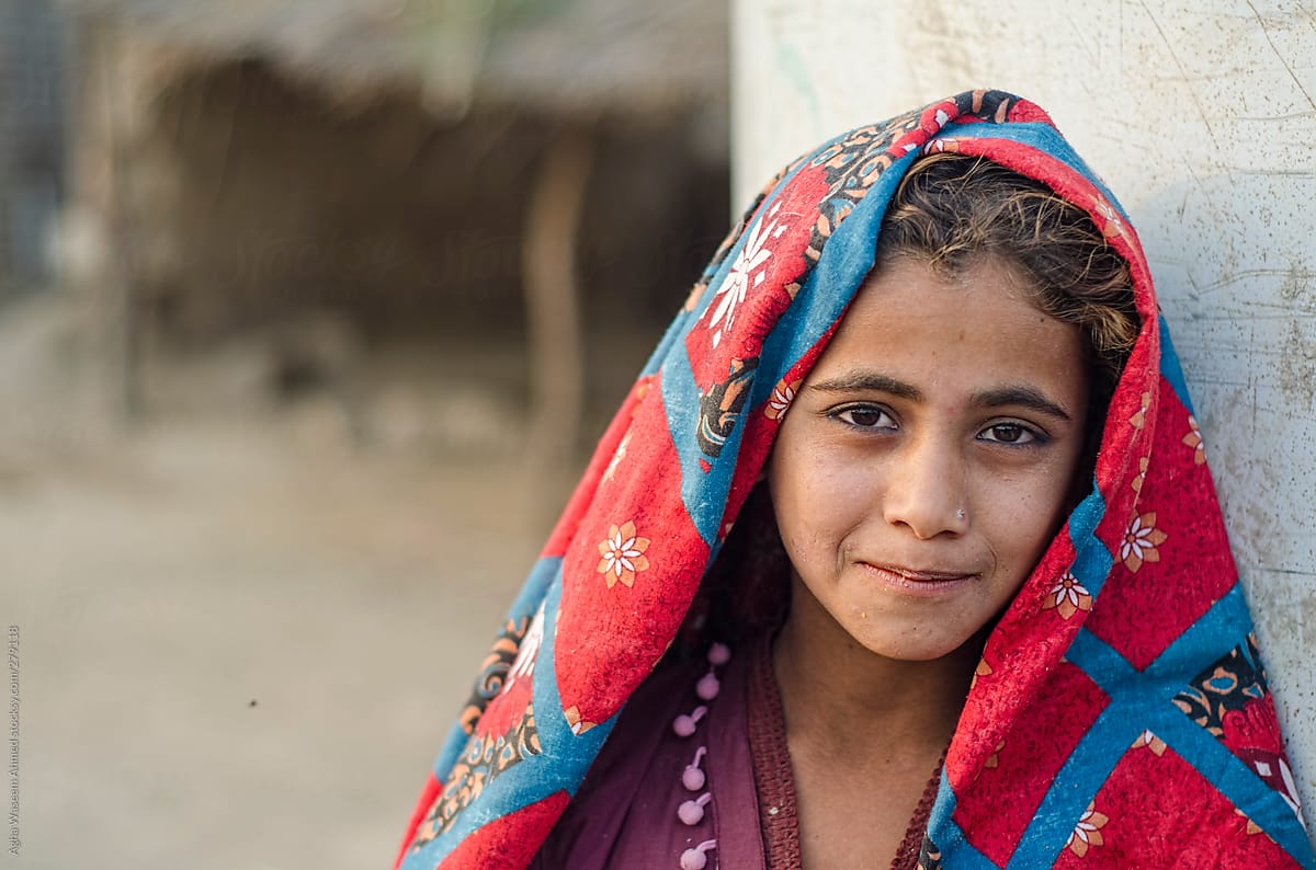 A village Girl  in red shawl