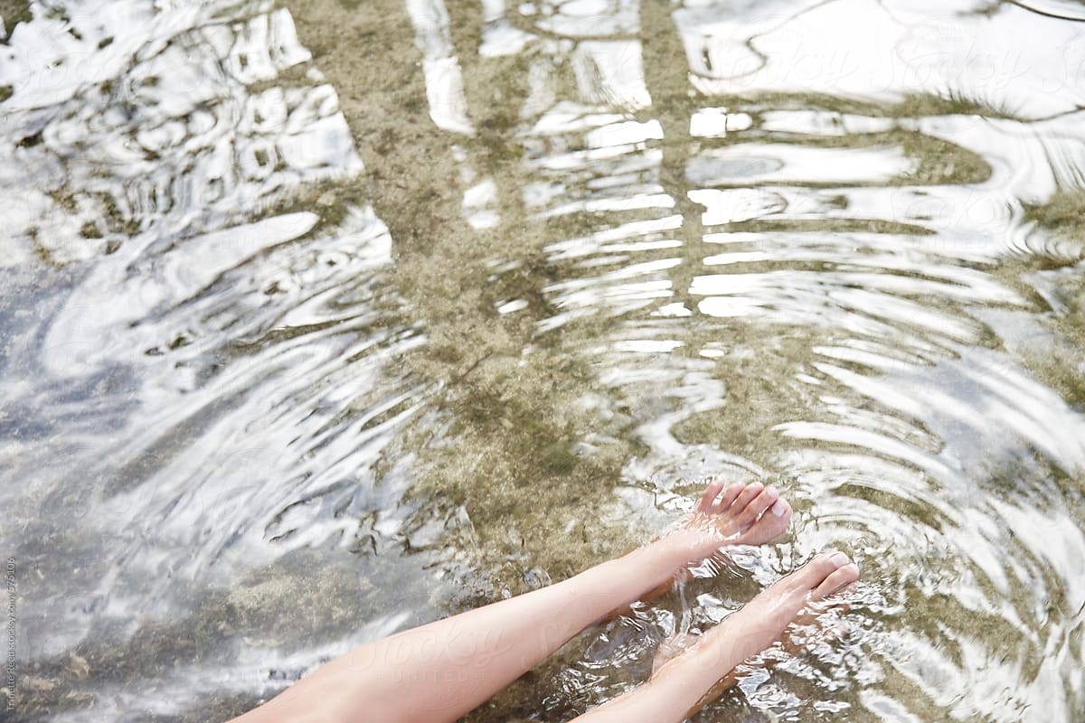 Woman's feet in water