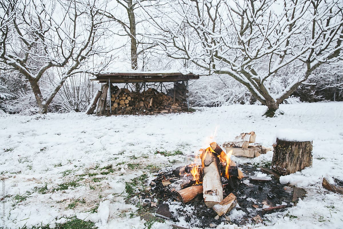 Small bonfire outdoors in the snow