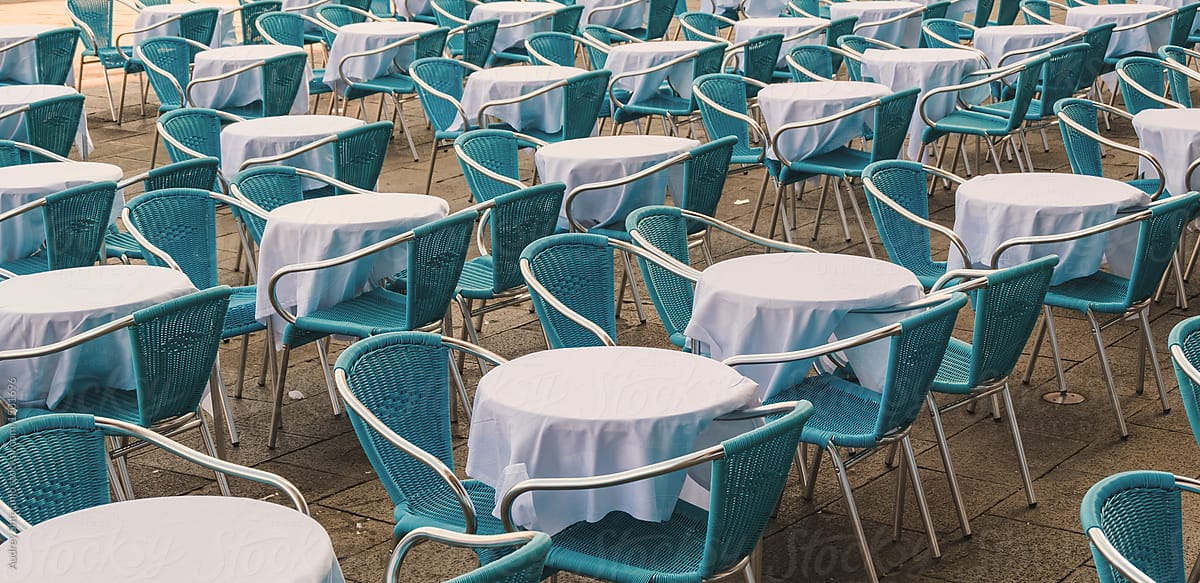 Empty restaurant chairs and tables